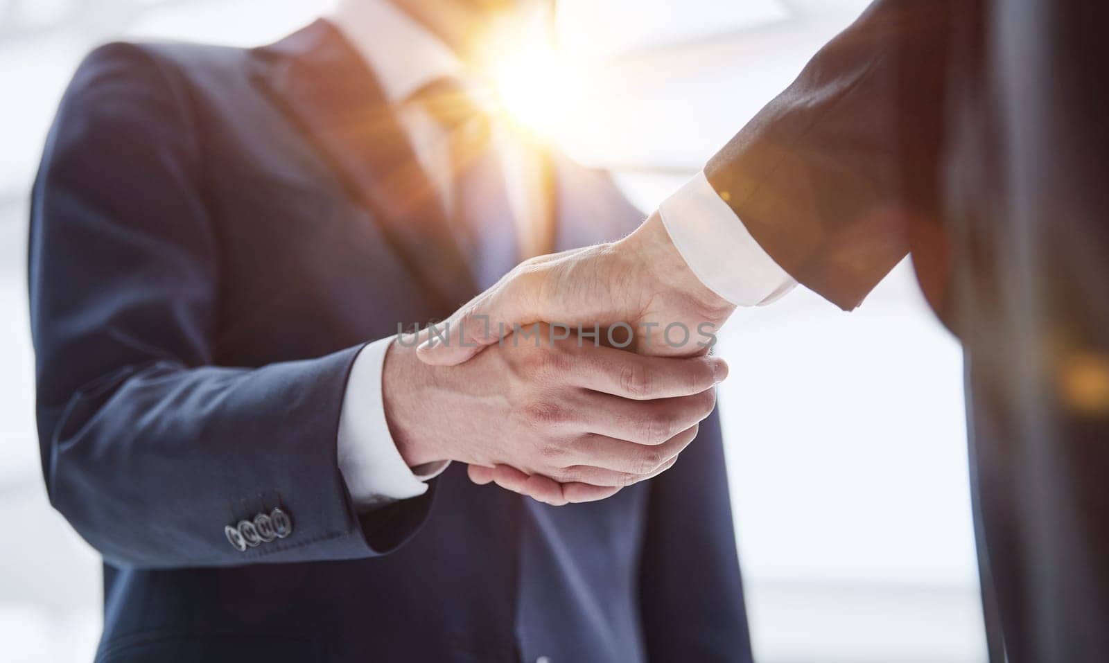 People Shaking Hands at Meeting Close Up by Prosto