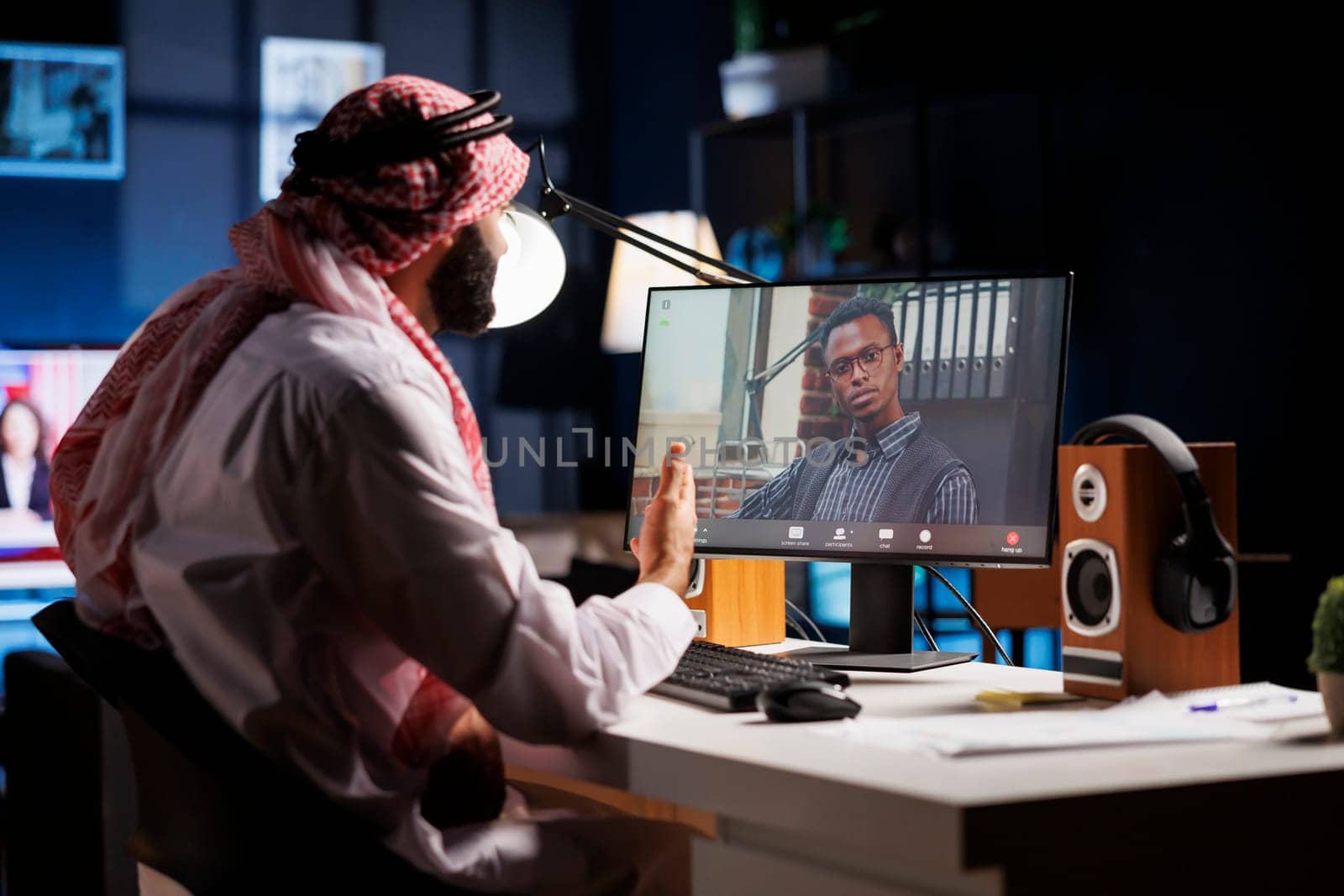 Men participate in video conferencing by DCStudio