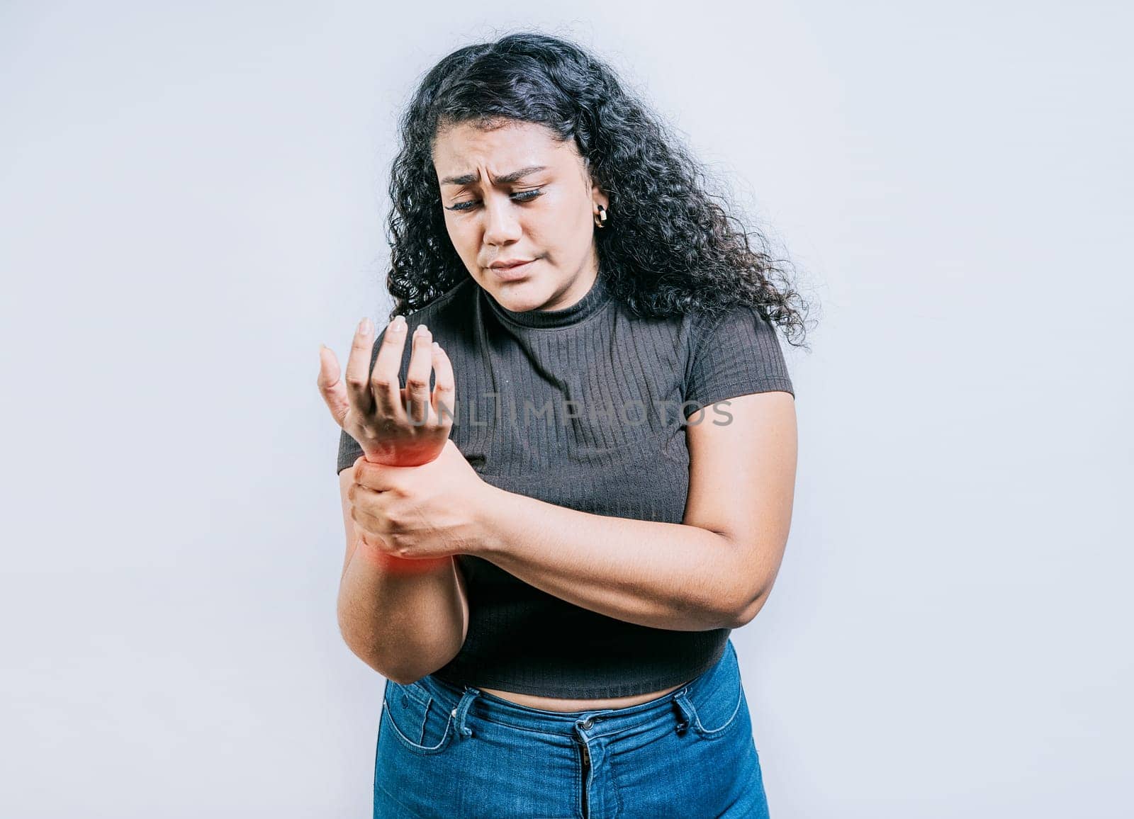 People with wrist pain and arthritis isolated. Young woman with arthritis isolated.. Wrist pain and arthritis concept by isaiphoto