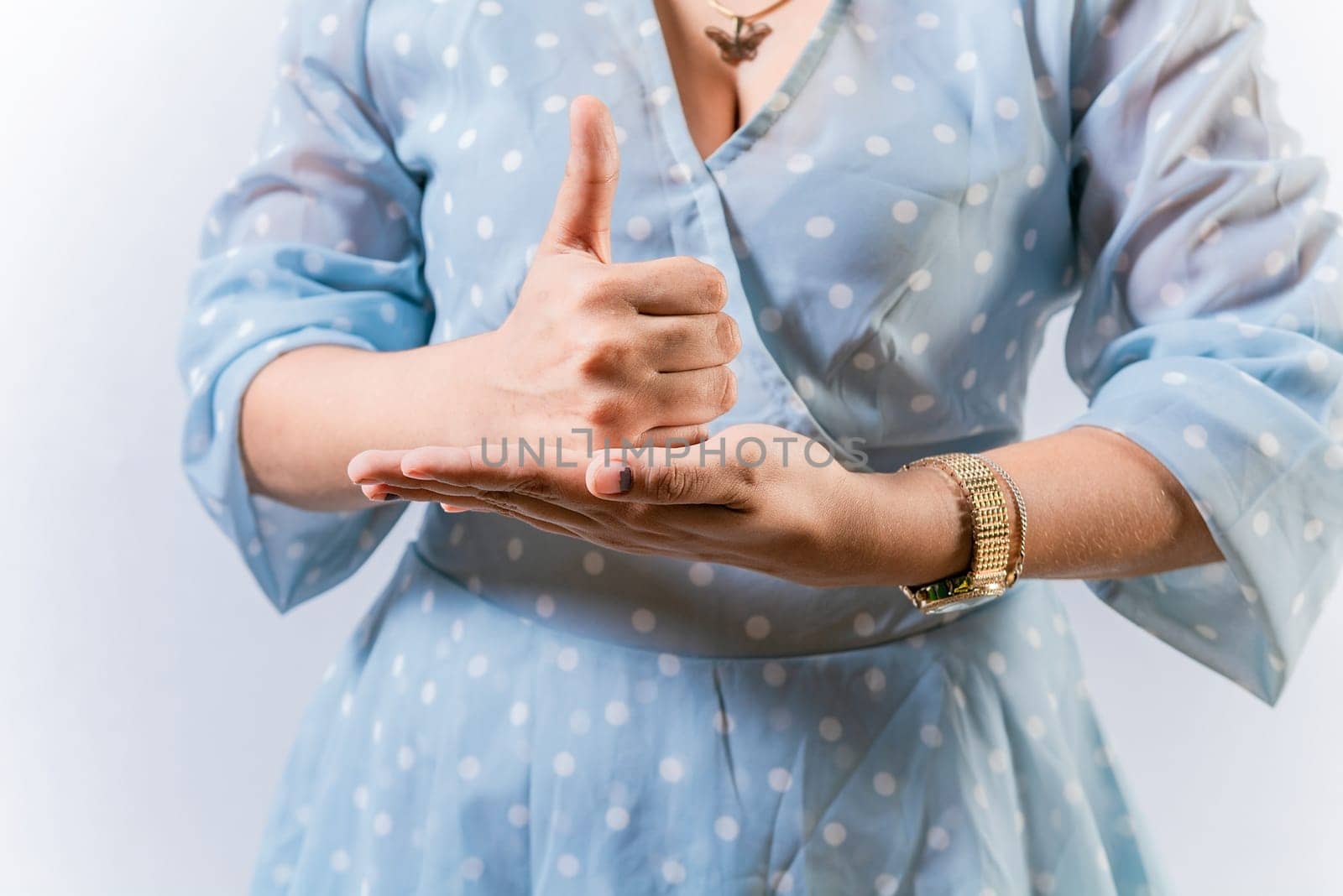Hands of person gesturing help in sign language. Help gesture with hands in sign language by isaiphoto