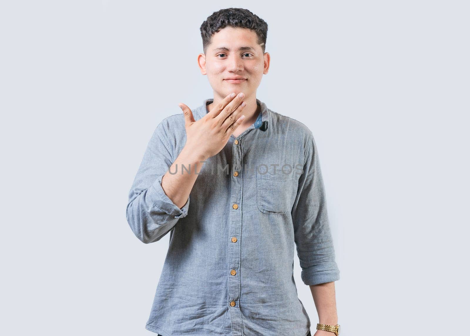 Man making THANK YOU gesture in sign language isolated. People showing THANK YOU gesture in sign language. Non-verbal communication concept by isaiphoto