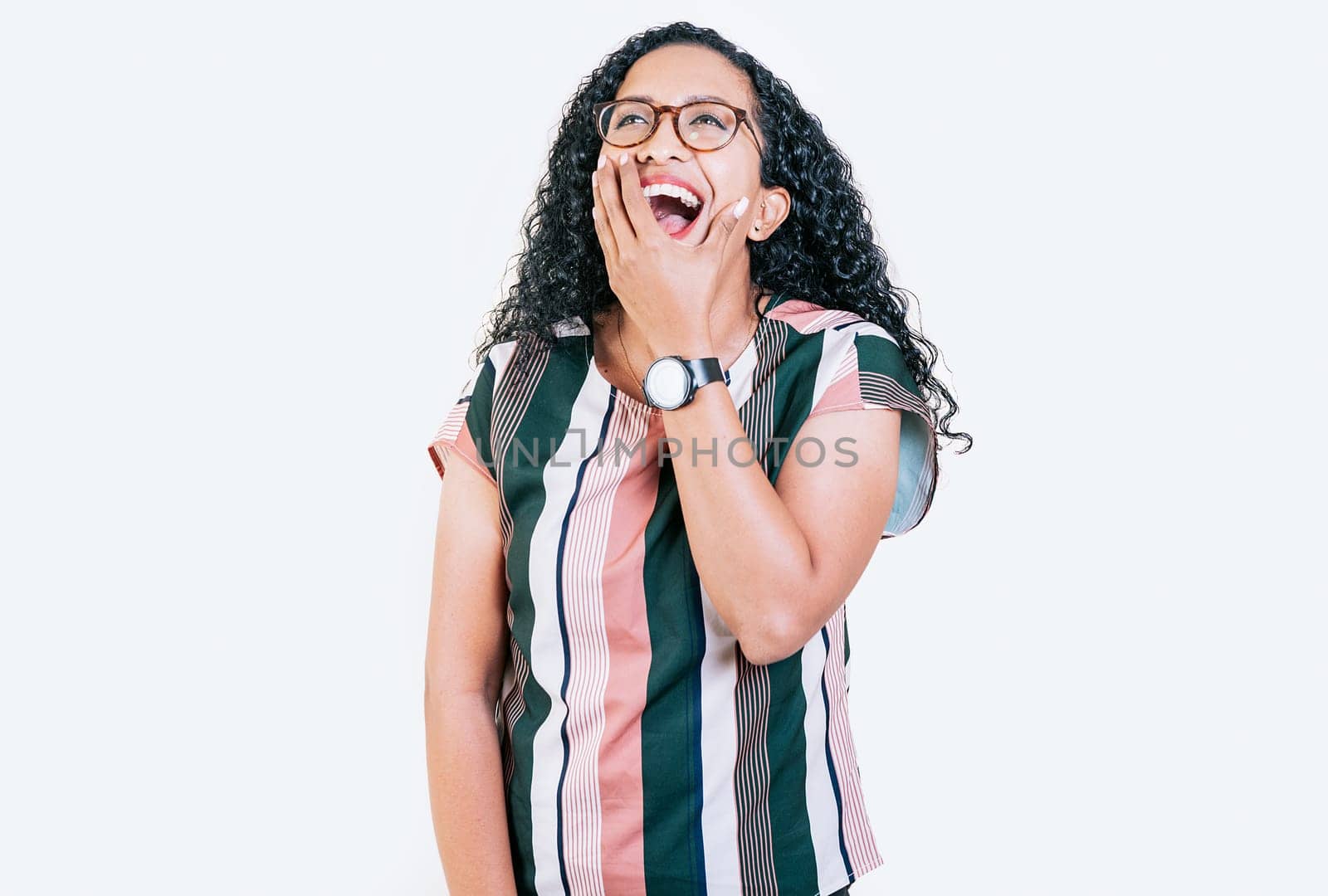 Funny young afro woman laughing on isolated background. Young woman in glasses laughing out loud isolated