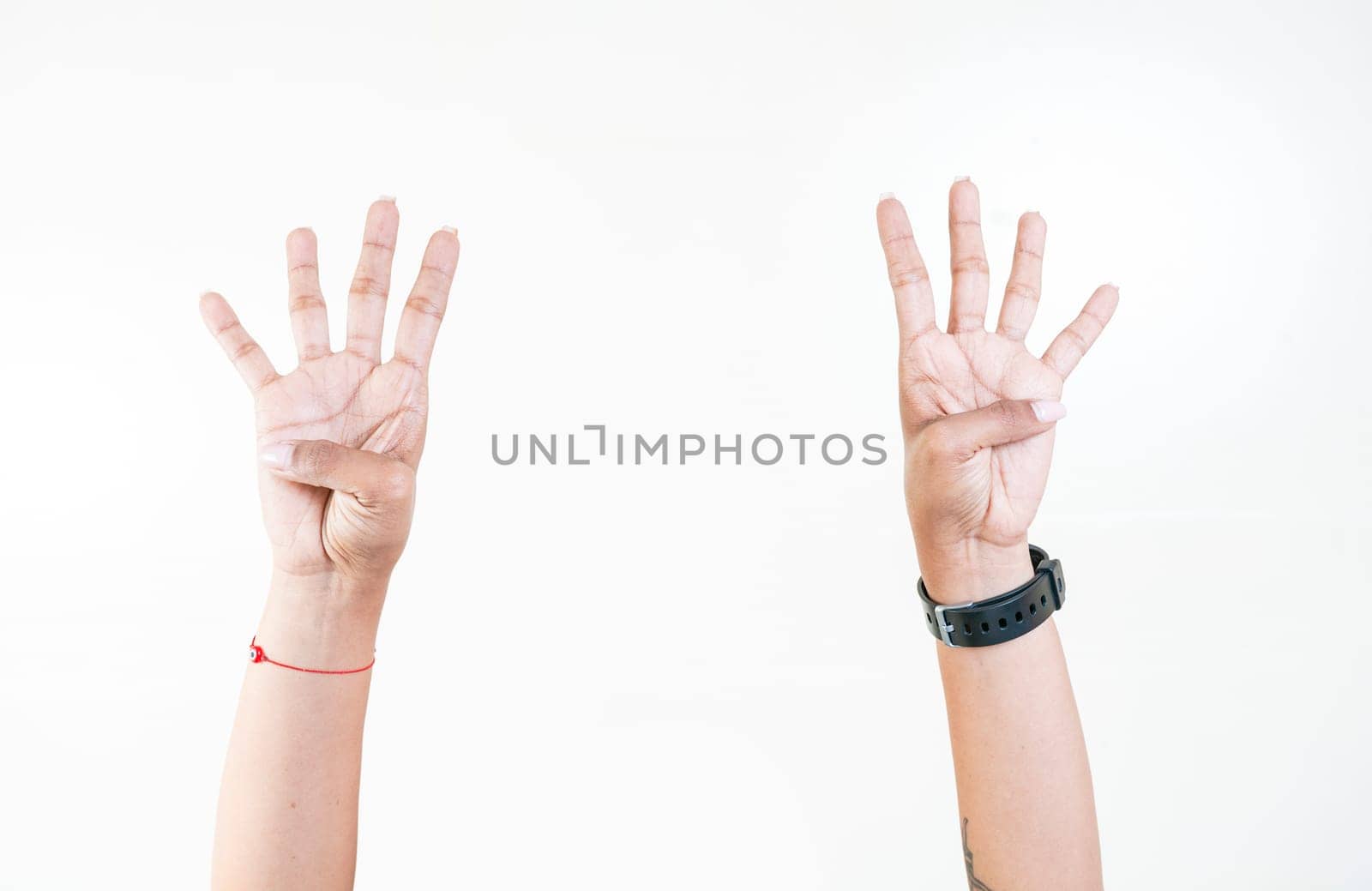 Hands counting number four. Woman hands showing number four isolated, Fingers counting number four by isaiphoto