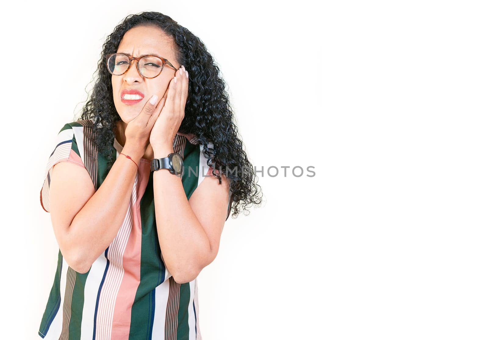 Young afro woman suffering with toothache isolated. Afro girl rubbing cheek with toothache on white background