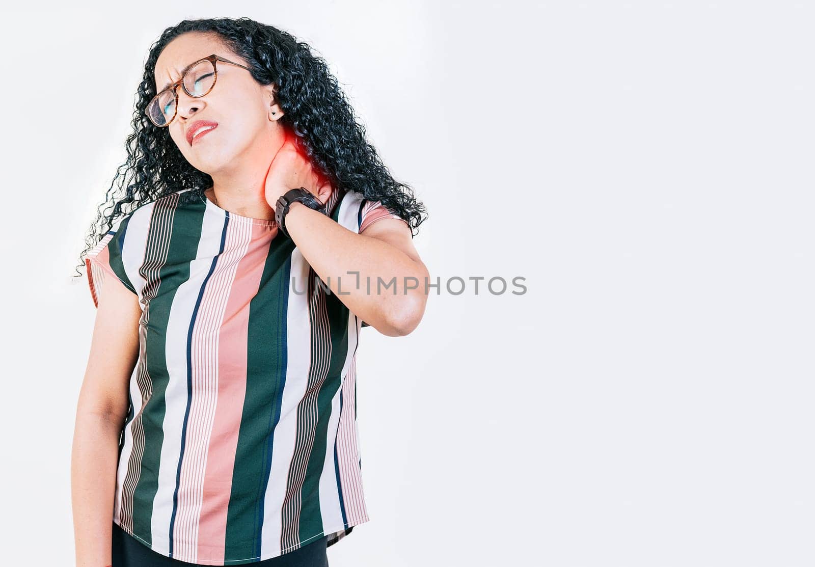 Afro girl suffering with neck pain isolated. Young woman with neck tension isolated. Neck pain and stress concept by isaiphoto