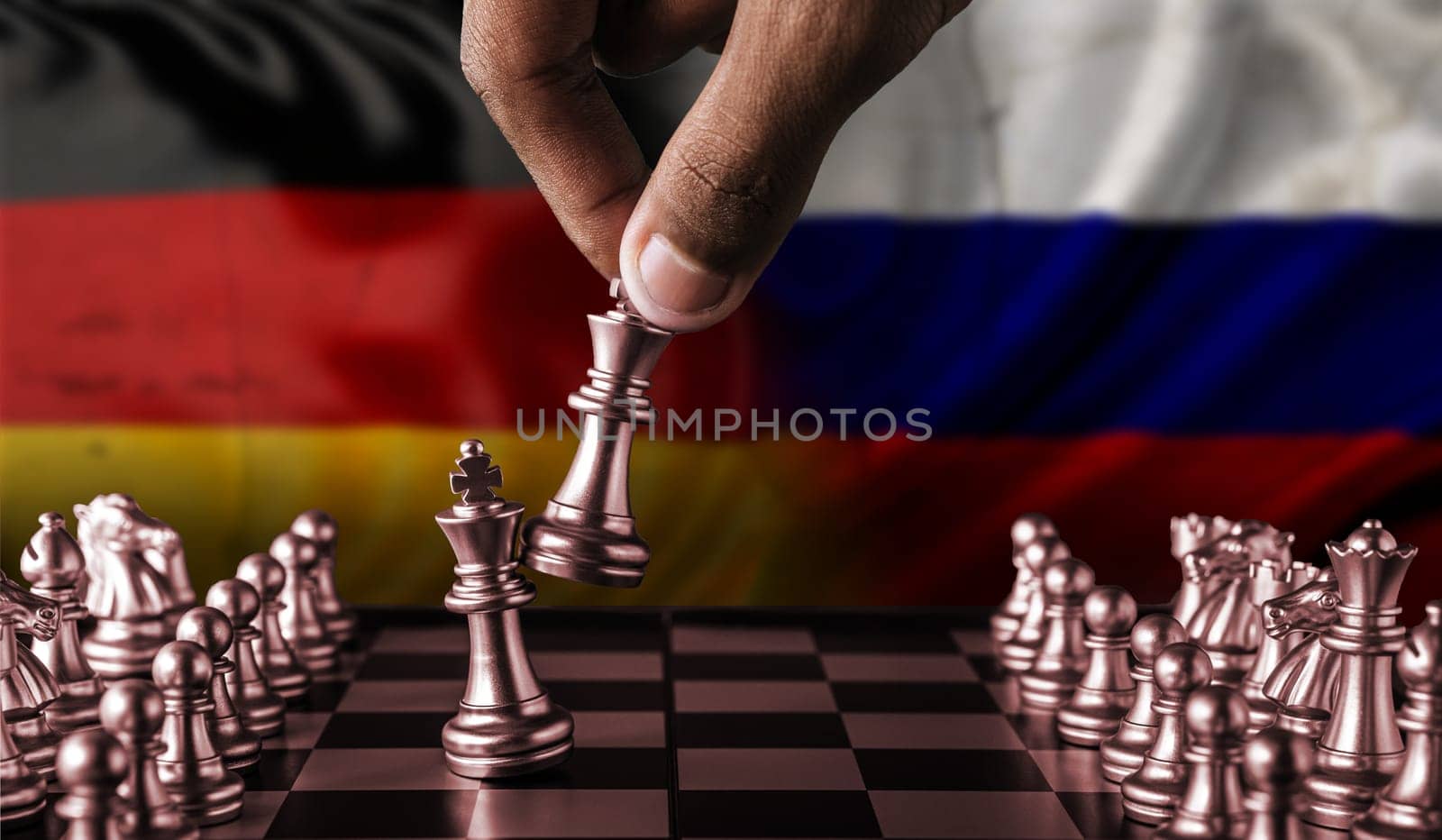 Political tension between Russia and Germany. Russia vs Germany flag on chessboard by isaiphoto