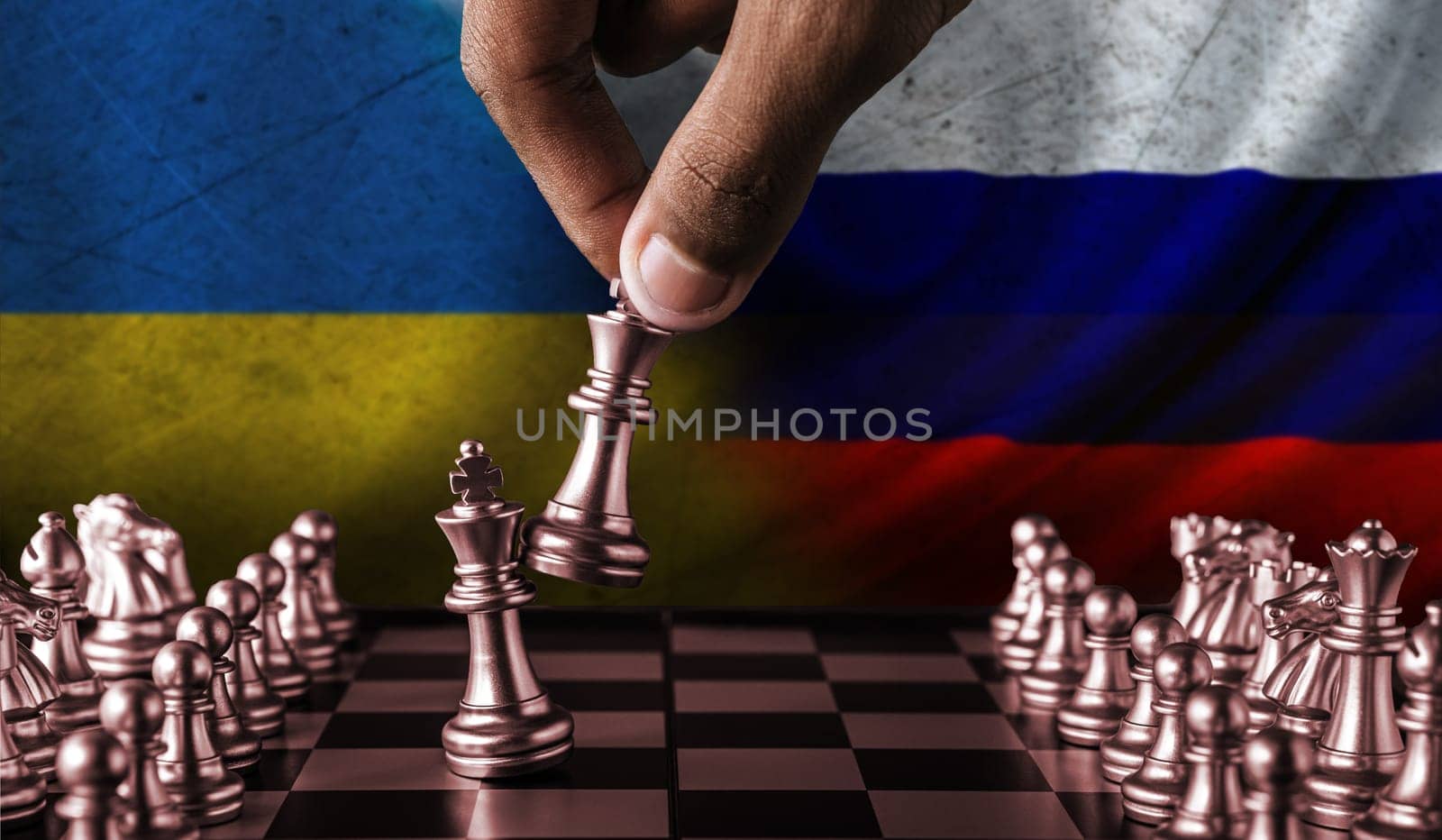 Russia vs Ukraine flag concept on chessboard. Political tension between Russia and Ukraine. Conflict between Russia and Ukraine over chess pieces