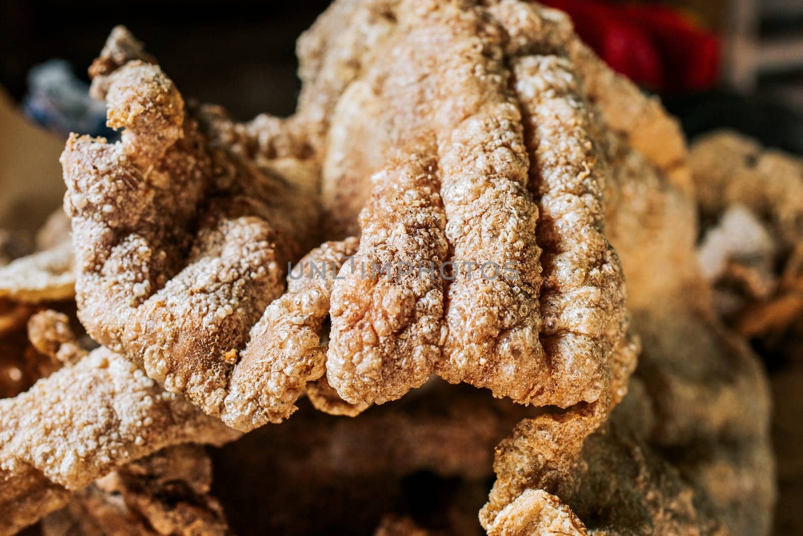 Close up of homemade Nicaraguan pork rinds. Close up of homemade chicharron on the table