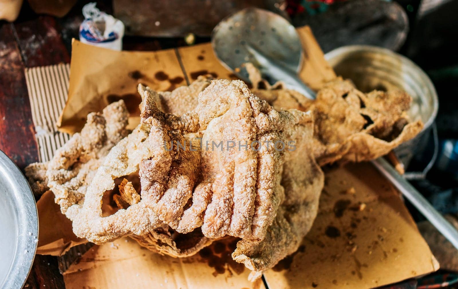 Top view of homemade chicharron on the table. Homemade Nicaraguan pork rinds by isaiphoto