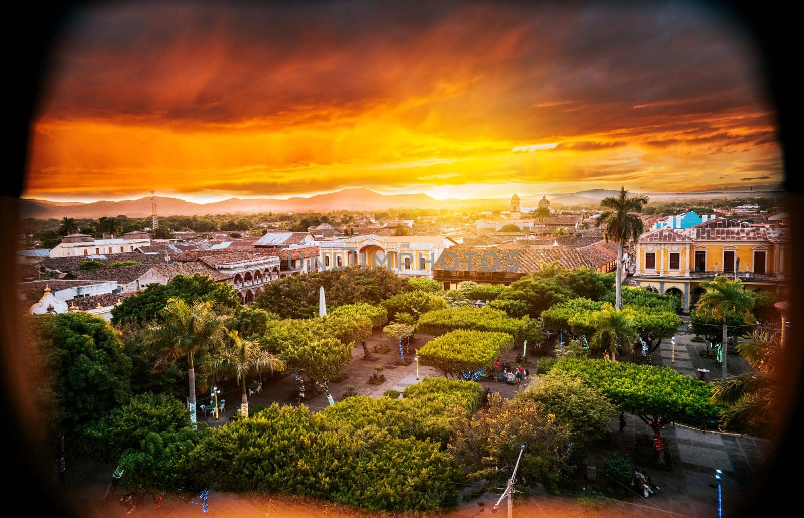 View of the central park of Granada at sunset. Beautiful view of central park of Granada from the viewpoint. Tourist places in Granada, Nicaragua by isaiphoto