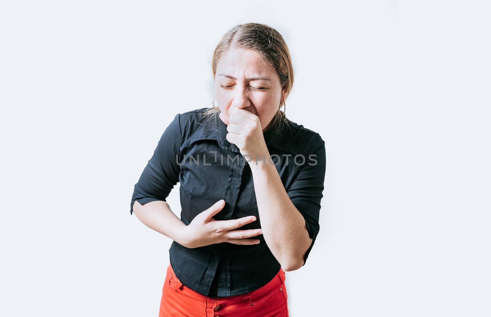 Young woman suffering from cough isolated. Girl with bronchitis coughing hard isolated by isaiphoto
