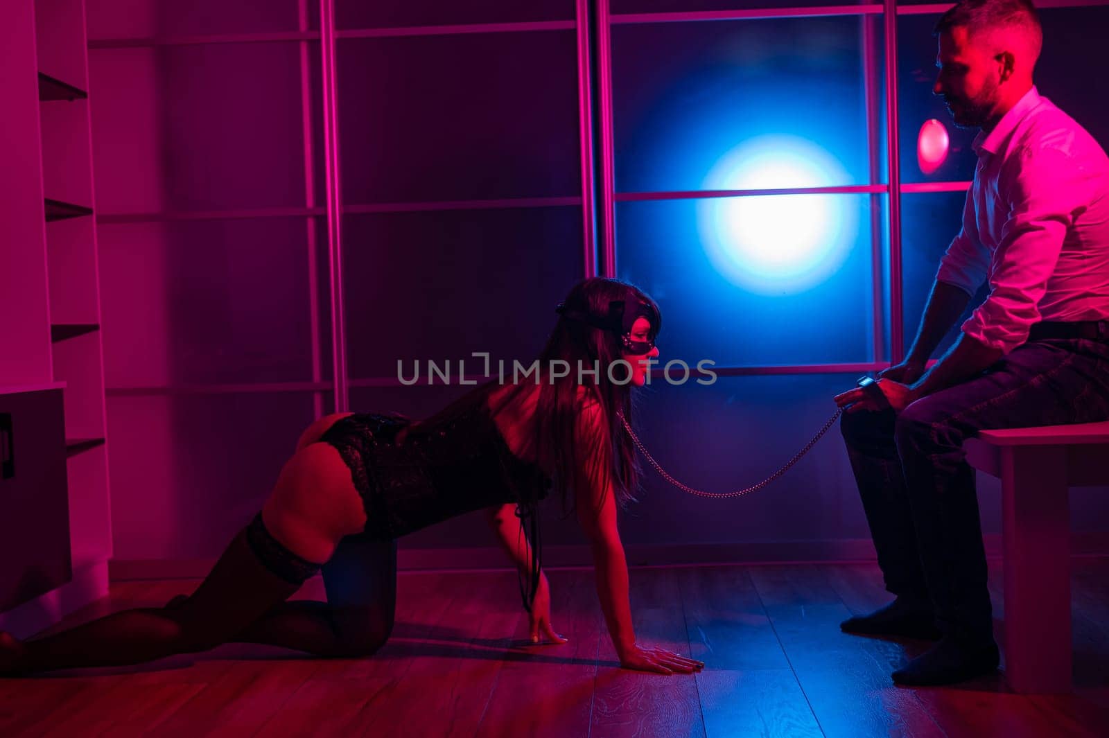 A woman is kneeling in front of a man. Role-playing games