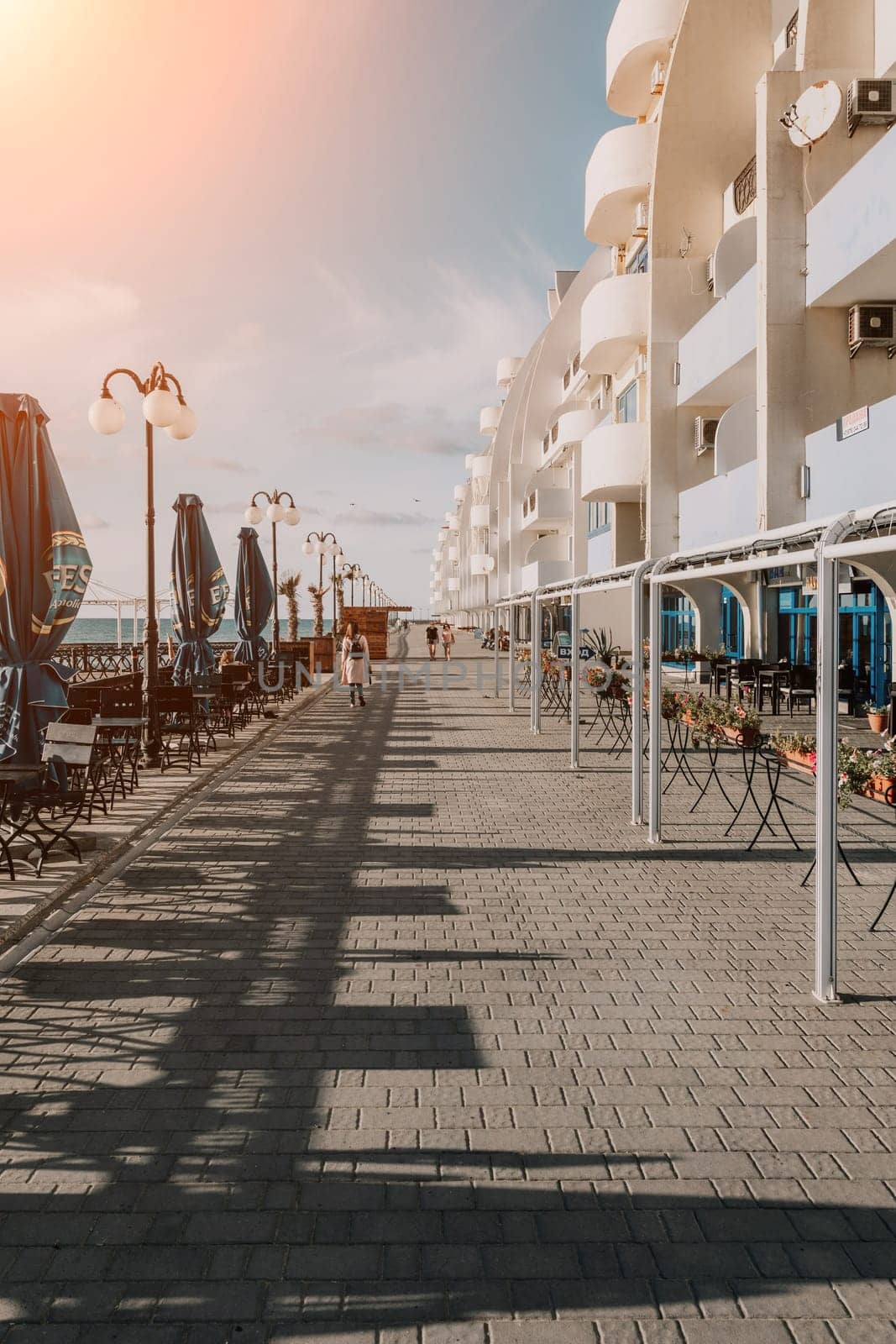 coastal area with apartment buildings of residential areas, modern hotel and restaurant complex on water and sandy beaches