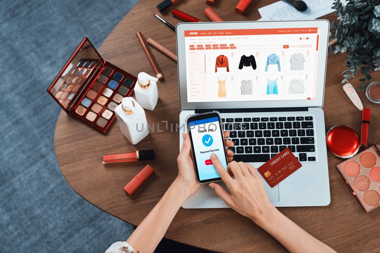 Woman shopping online on internet marketplace browsing for sale items for modern lifestyle and use credit card for online payment from wallet protected by utmost cyber security software