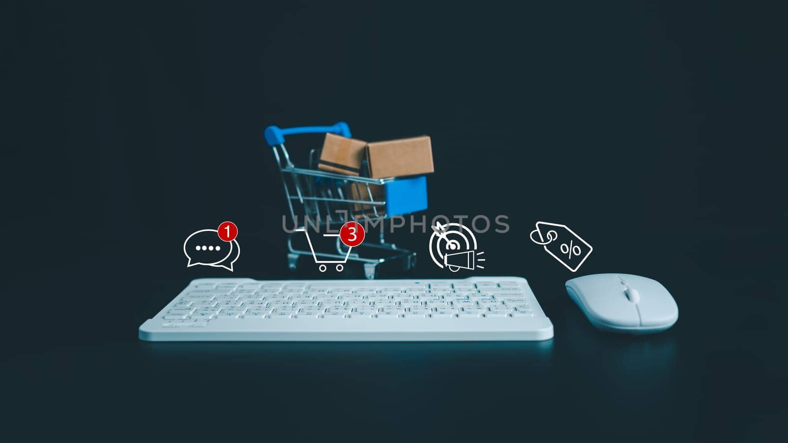 Boxes in a shopping car and keyboard on dark background. Ideas about online shopping, Online shopping for electronic commerce, Allows consumers to directly buy goods from seller over the internet.