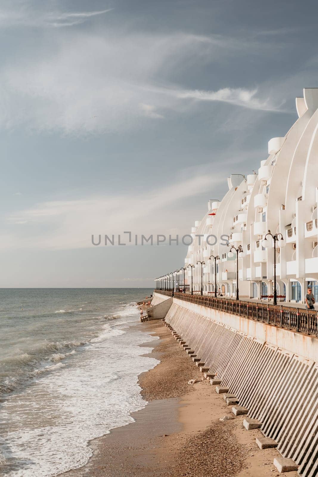 coastal area with apartment buildings of residential areas, modern hotel and restaurant complex on water and sandy beaches