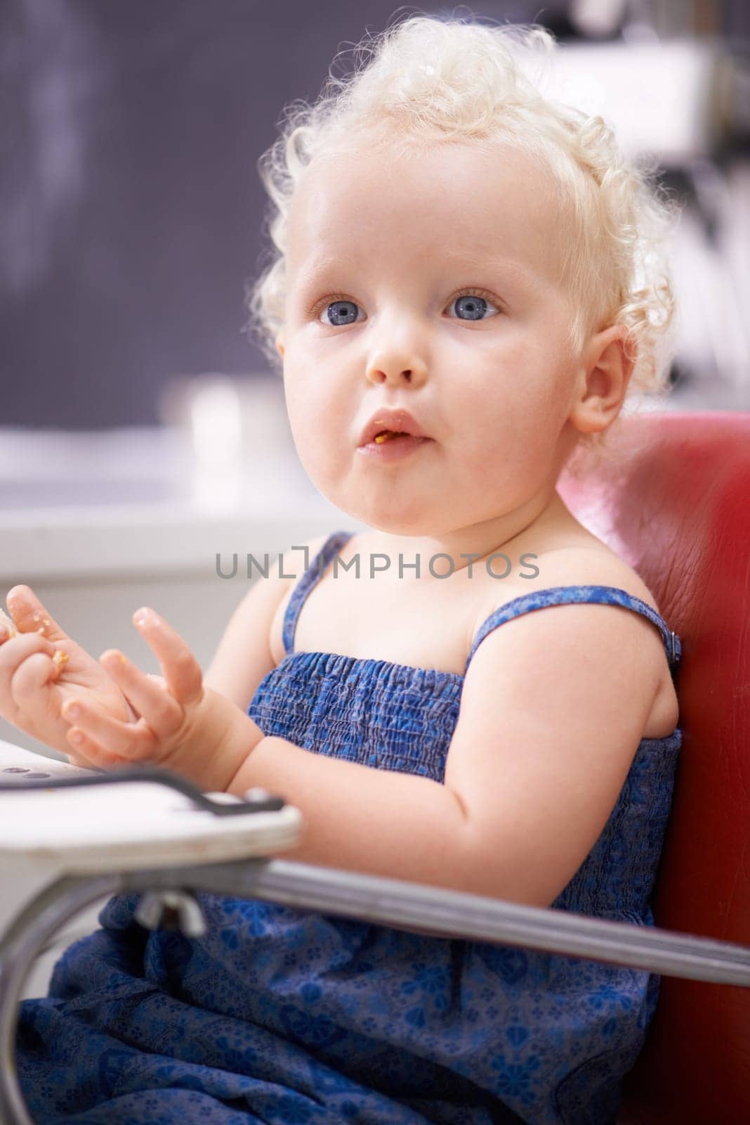 Food, high chair and baby eating, healthy diet and nutrition for breakfast in the morning at home. Hungry, kid and toddler with meal for growth, childhood development and cute adorable girl child by YuriArcurs