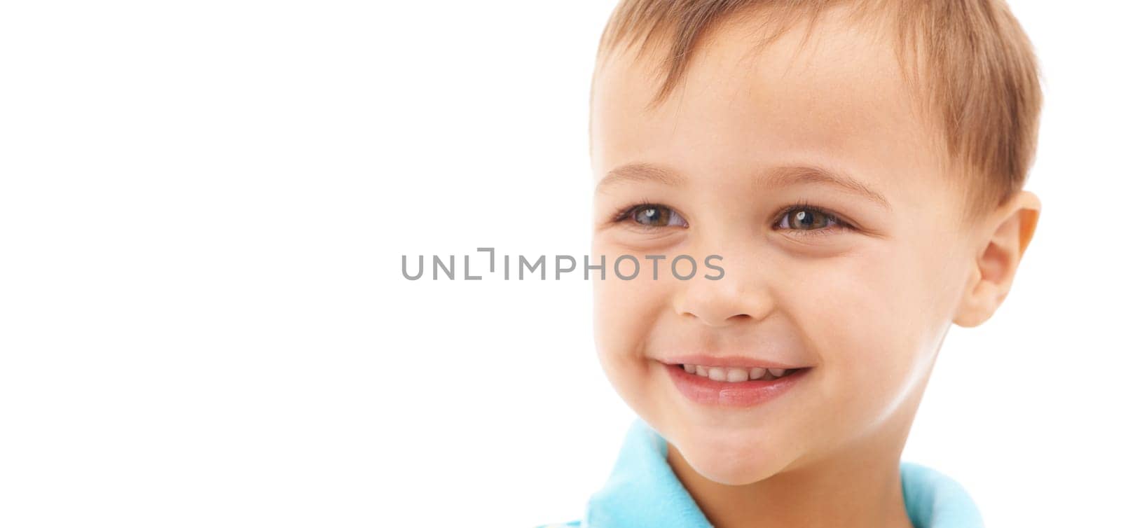 Boy, child and happy portrait in studio, white background and thinking in mockup space. Kid, face and smile with wellness, confidence and pride to start kindergarten with curious ideas or development by YuriArcurs