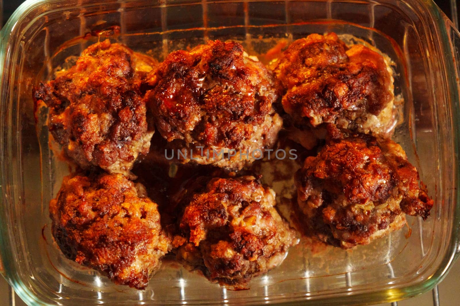 Sizzling Homemade Meatballs Fresh From the Oven Captured at Dinner Time by darksoul72