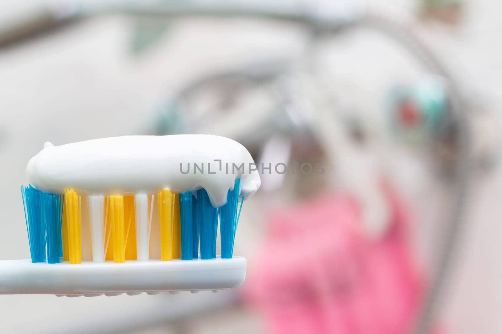 Tooth brush and white toothpaste close up by Vera1703