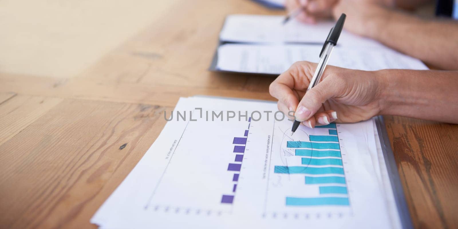 Business hands, paperwork and writing with data analysis, graphs and charts for financial report and budget in office meeting. People with documents, revenue and statistics for profit or sales growth by YuriArcurs