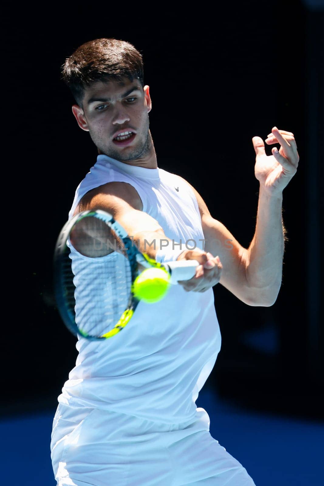 MELBOURNE, AUSTRALIA - JANUARY 11: Carlos Alcaraz of Spain completes a training session with Stan Wawrinka of Switzerland ahead of the 2024 Australian Open at Melbourne Park on January 11, 2024 in Melbourne, Australia.