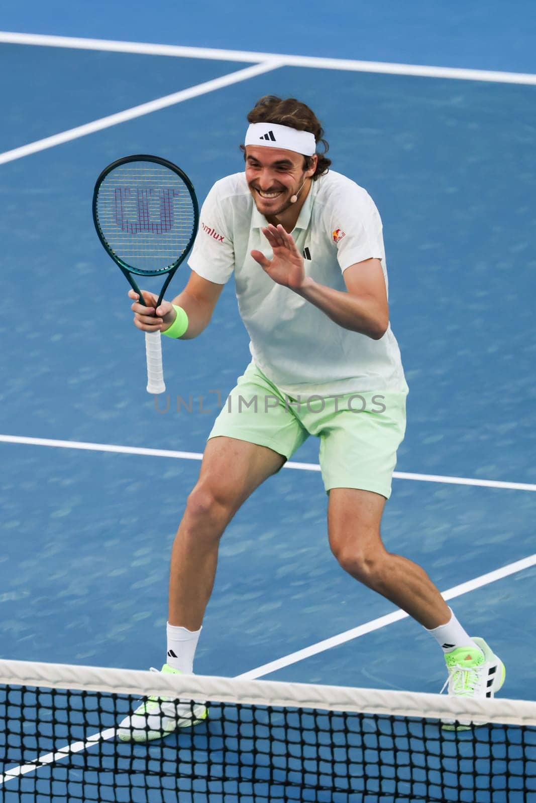 MELBOURNE, AUSTRALIA - JANUARY 11: Stefanos Tsitsipas of Greece plays against Novak Djokovic of Serbia during a charity match ahead of the 2024 Australian Open at Melbourne Park on January 11, 2024 in Melbourne, Australia.