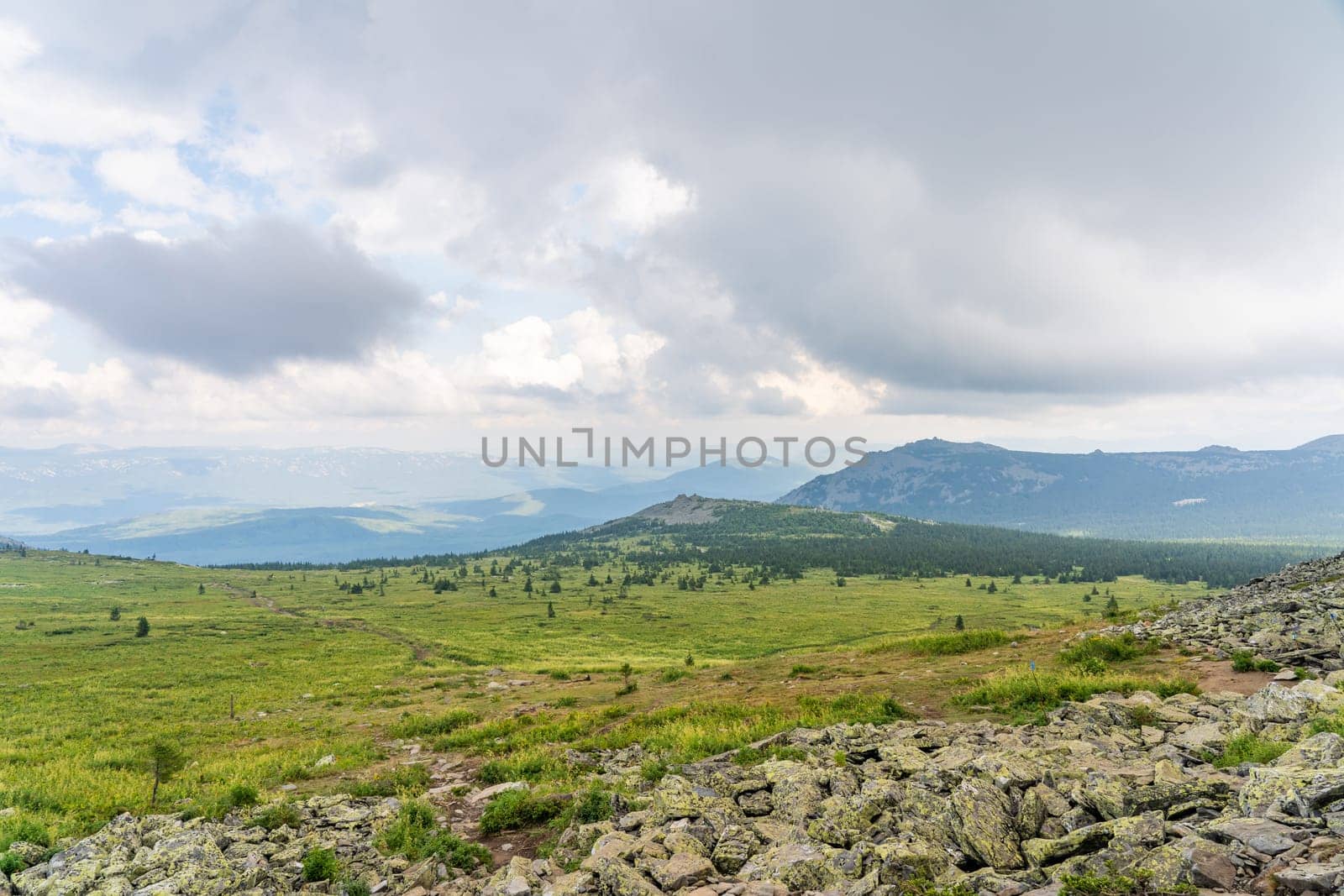 Forests and mountains of the Southern Urals near the village of Tyulyuk in Russia. Drone view. by DovidPro