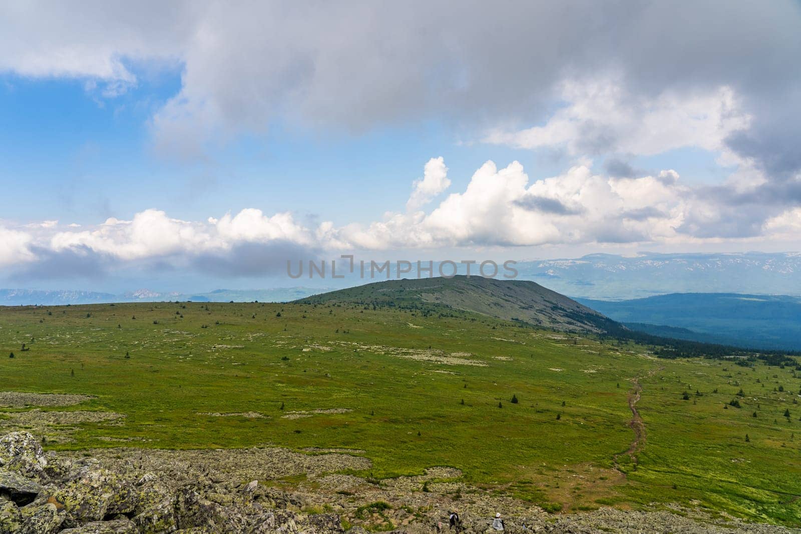 Forests and mountains of the Southern Urals near the village of Tyulyuk in Russia. Drone view