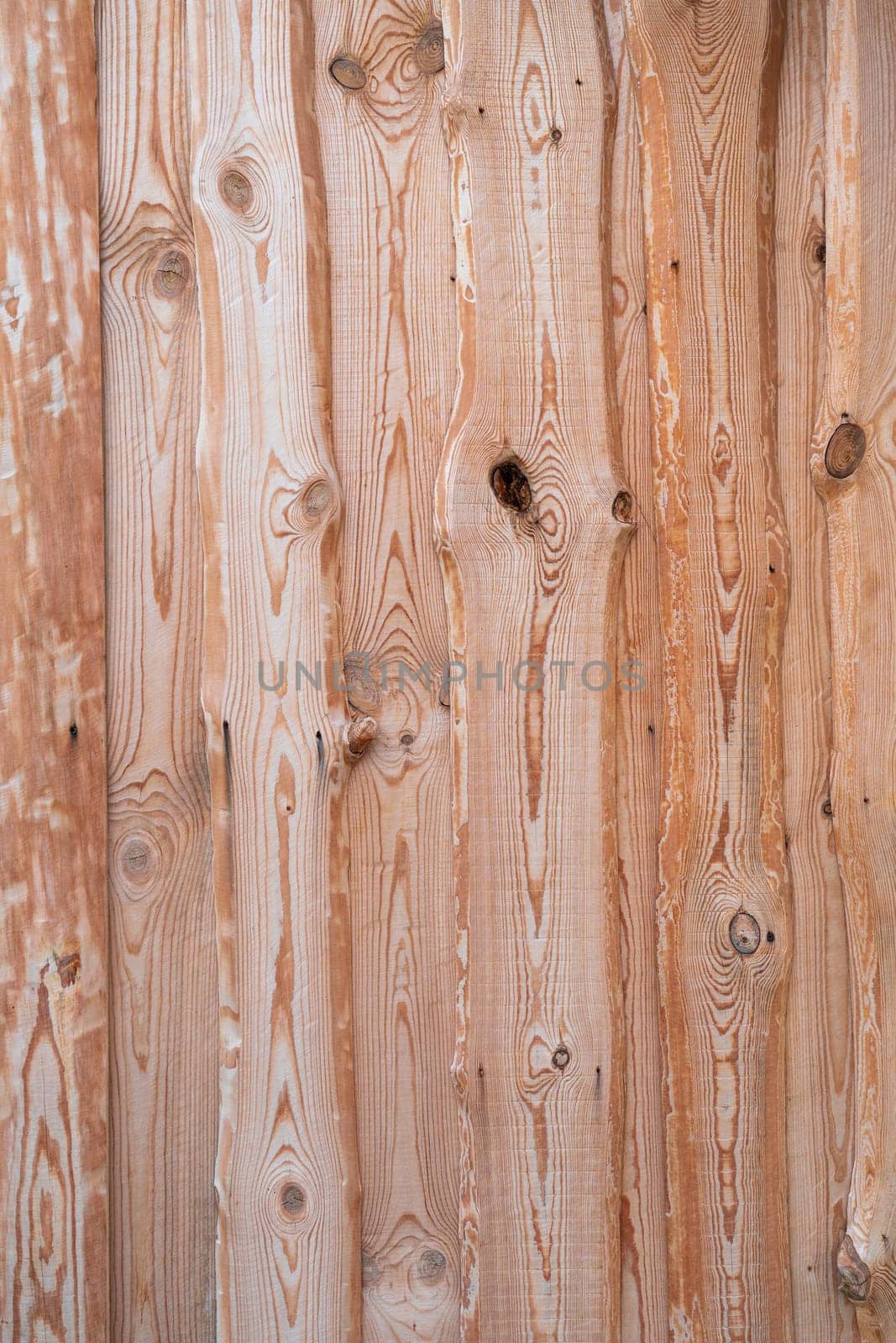 Wooden barn wall made of boards in russian village