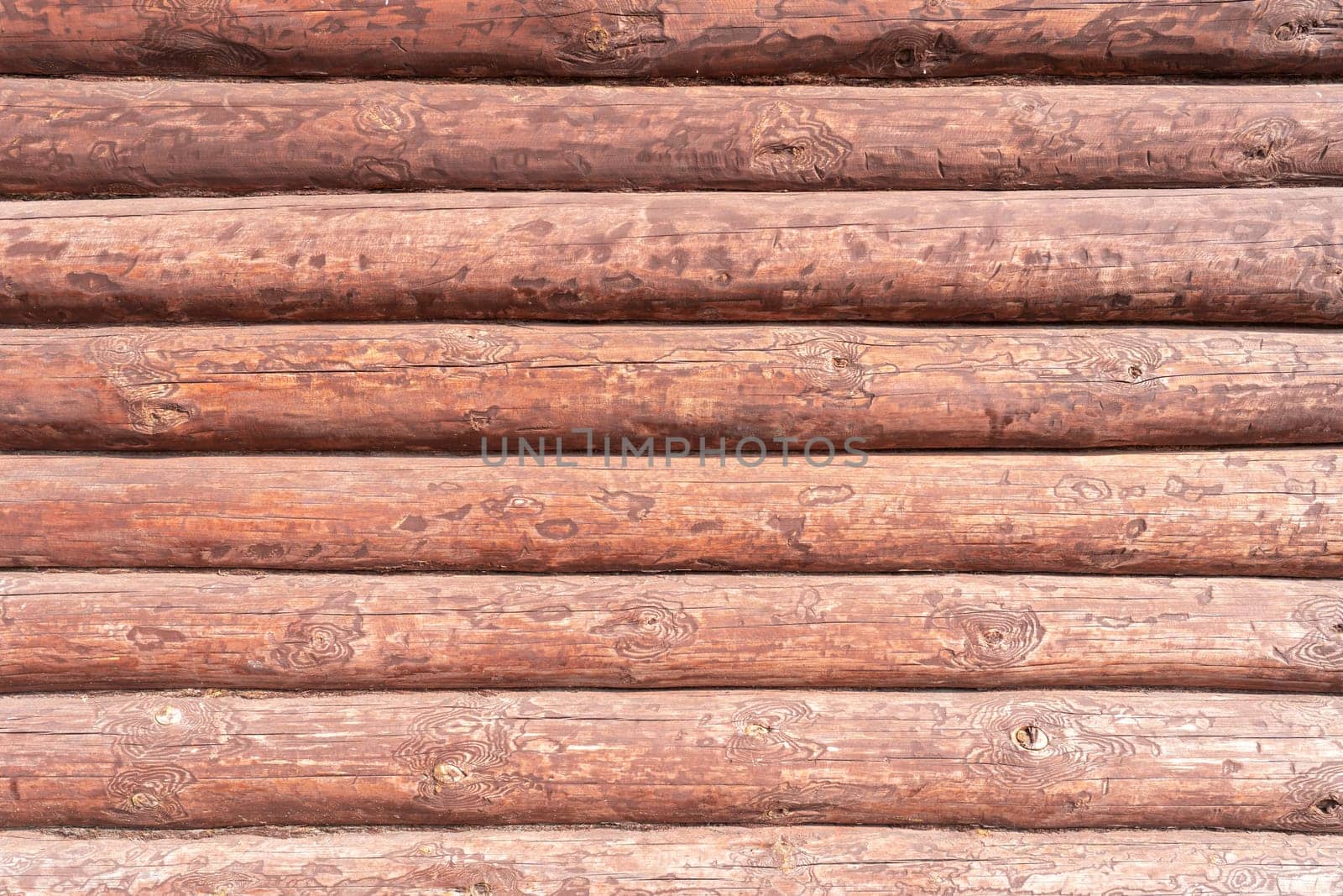 House wall in the village. Russian masonry of logs in the southern Urals. by DovidPro