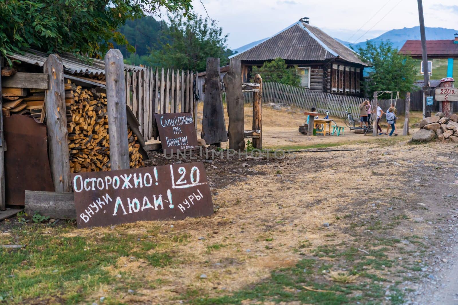 Tyulyuk, Russia - July 22, 2020: Russian funny and humorous inscriptions in the village of Tyulyuk in the South Urals. by DovidPro