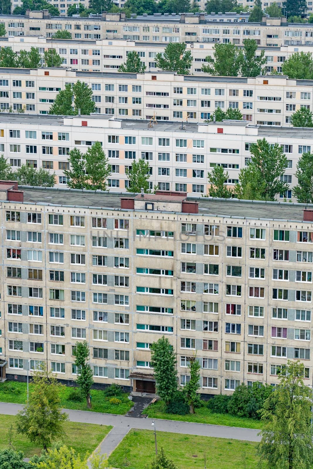 Multi-storey residential apartment buildings in a residential area. by DovidPro