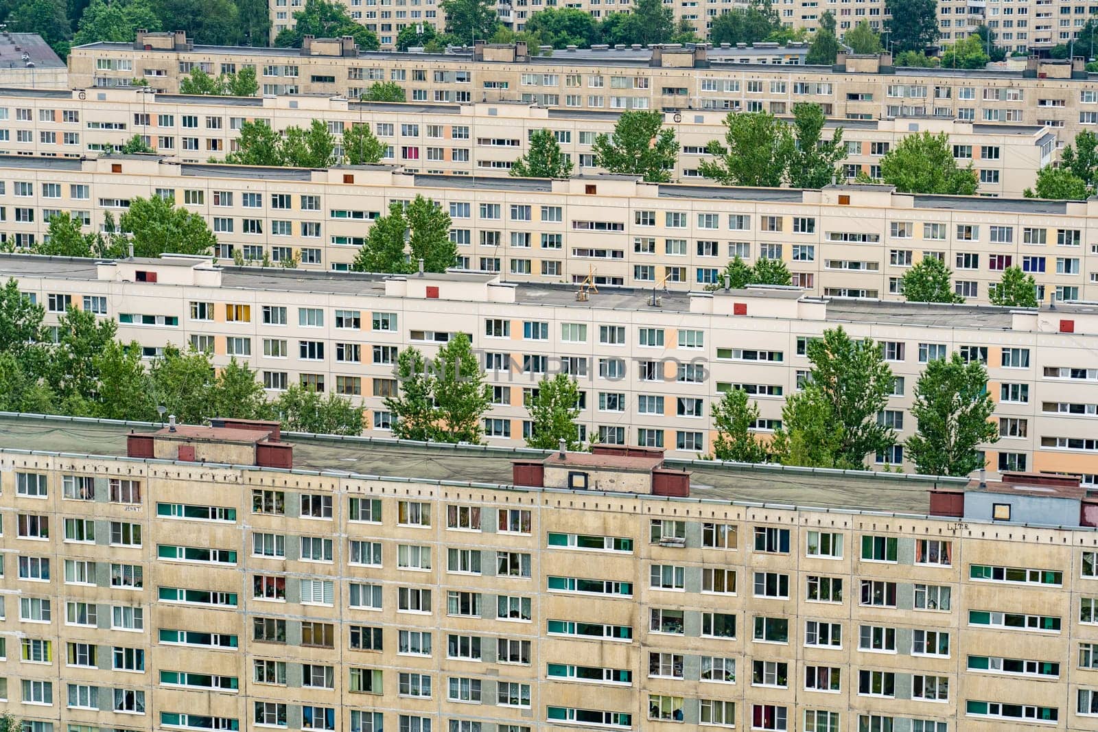 Multi-storey residential apartment buildings in a residential area. by DovidPro