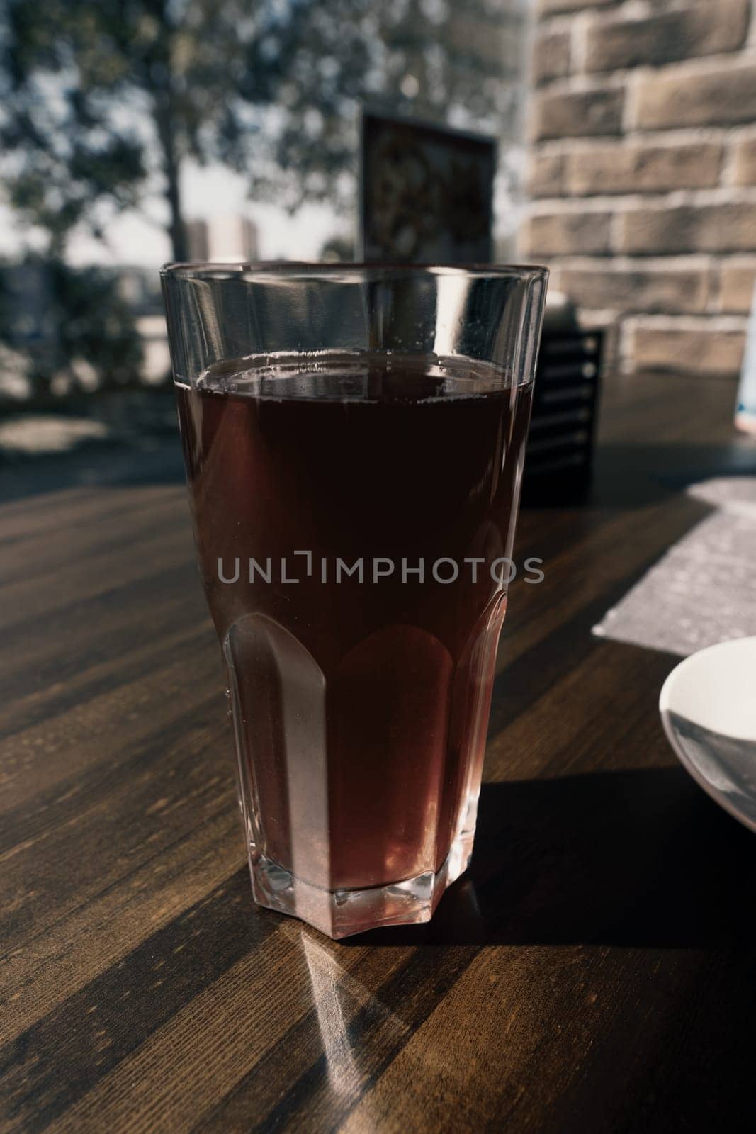Transparent glass on the table with lemonade. High quality photo