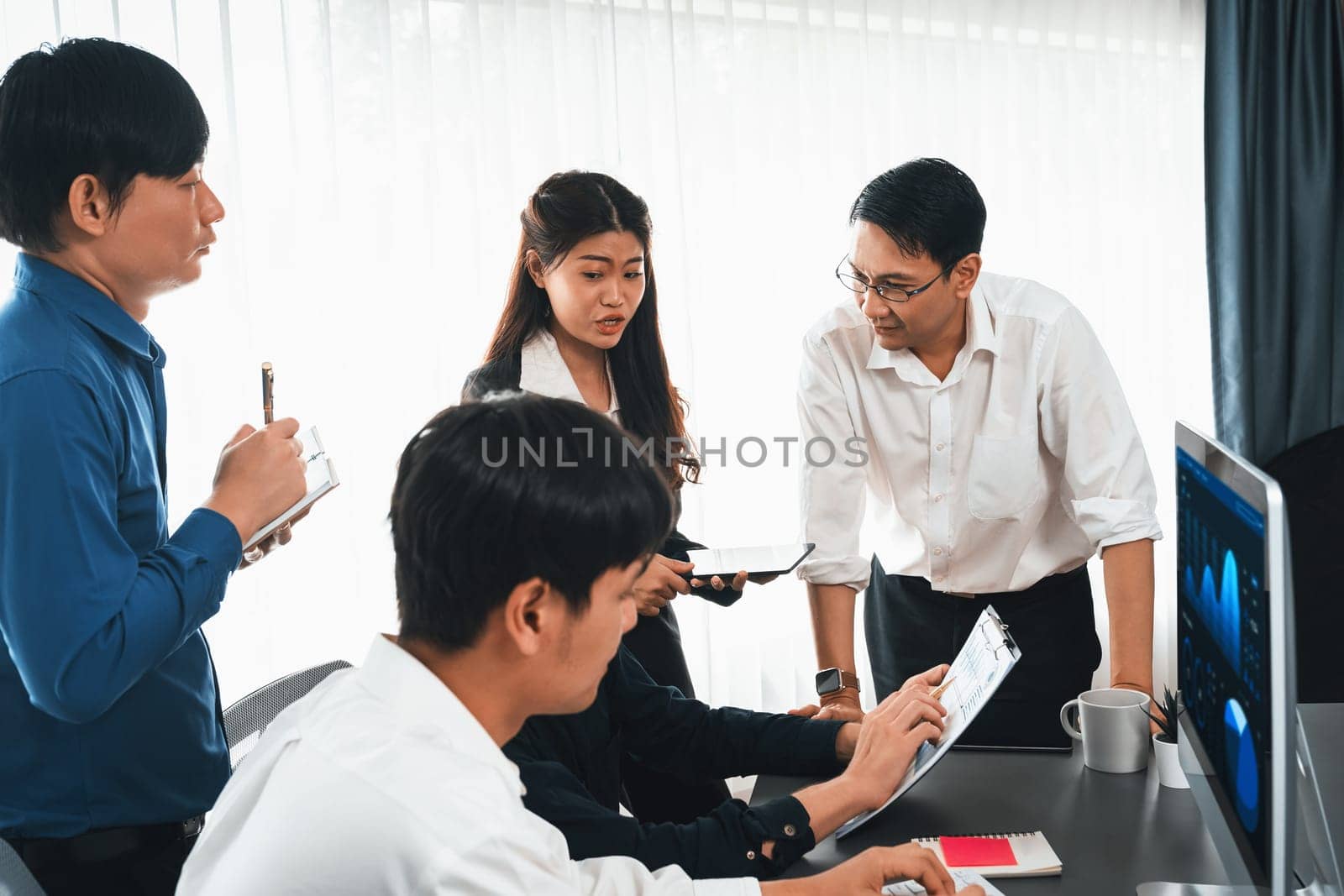 Group of diverse office worker employee working together on strategic business marketing planning in corporate office room. Positive teamwork in business workplace concept. Prudent