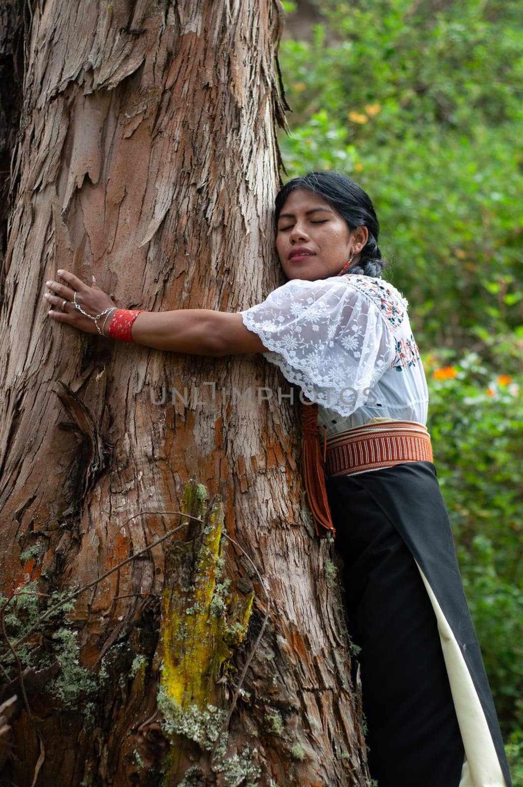 indigenous girl from otavalo, ecuador practising arbotherapy in the amazon. EARTH DAY by Raulmartin