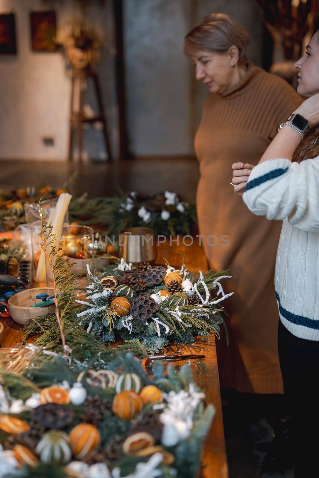 The Christmas spirit fills the flower and holiday decor store. by teksomolika