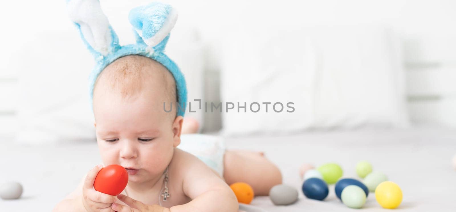 Cute little boy with bunny ears, Easter.