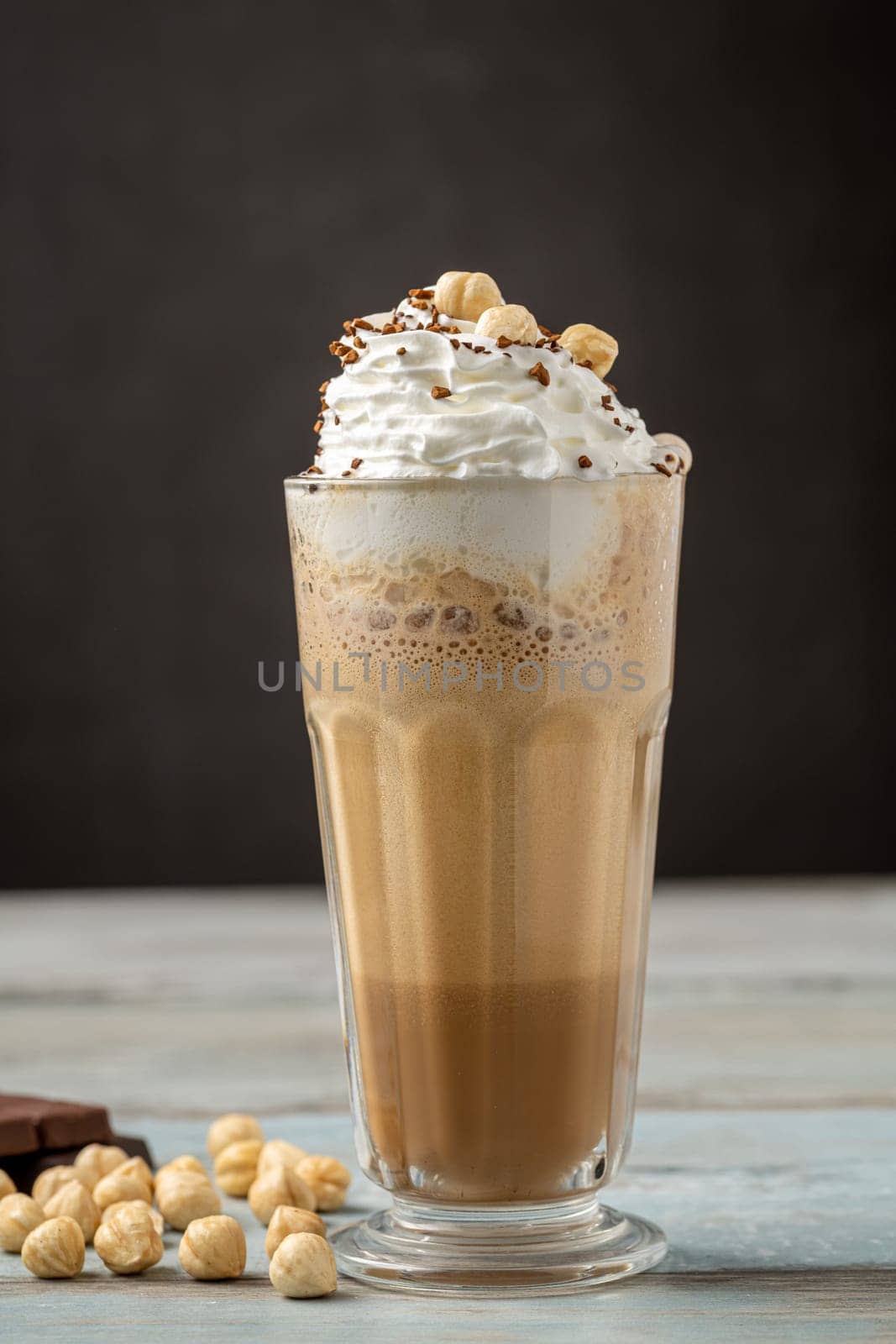 hazelnut and chocolate milkshake with coffee sprinkled on top