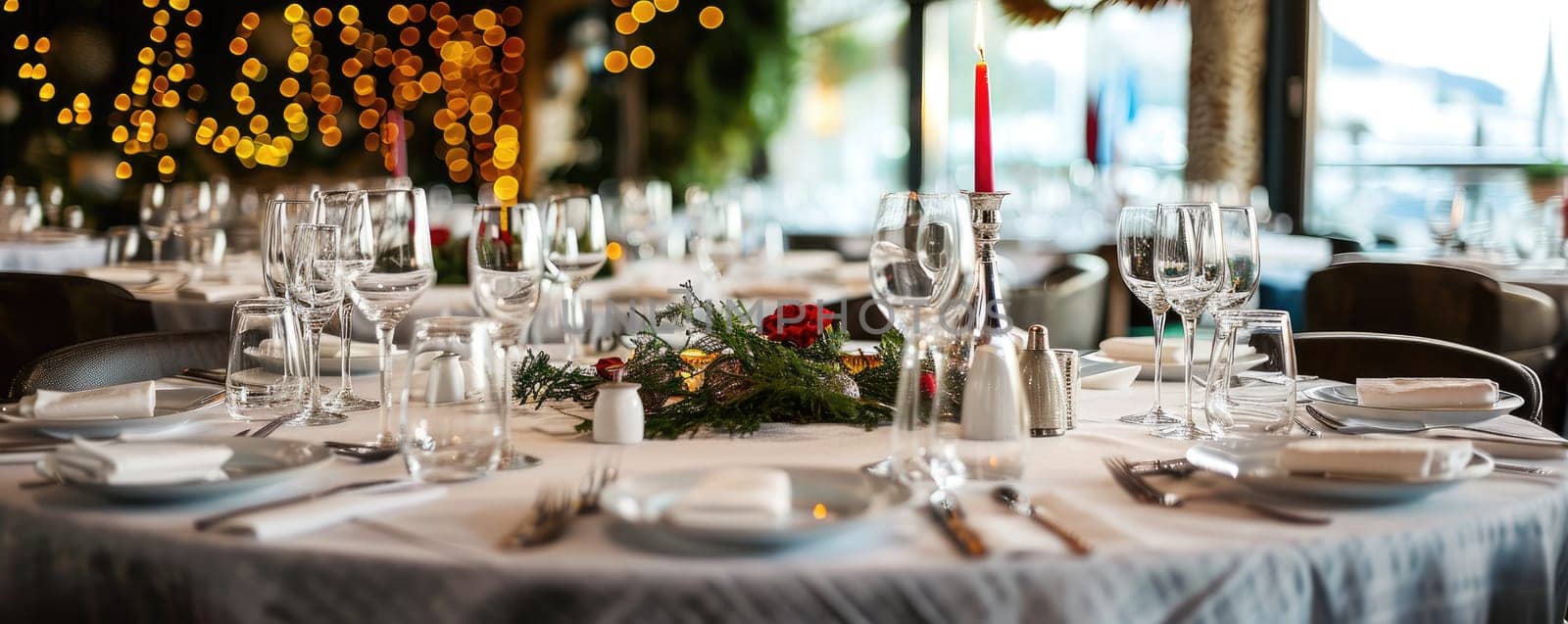 Festive table setting in a gourmet restaurant hall.