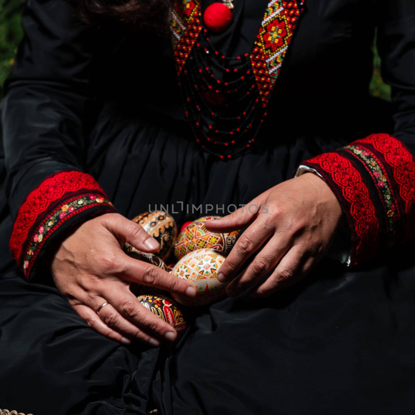 Ivano-Frankivsk, Ukraine August 14, 2023:Ukrainian Easter eggs in the hands of a woman, Ukrainian art and traditions.
