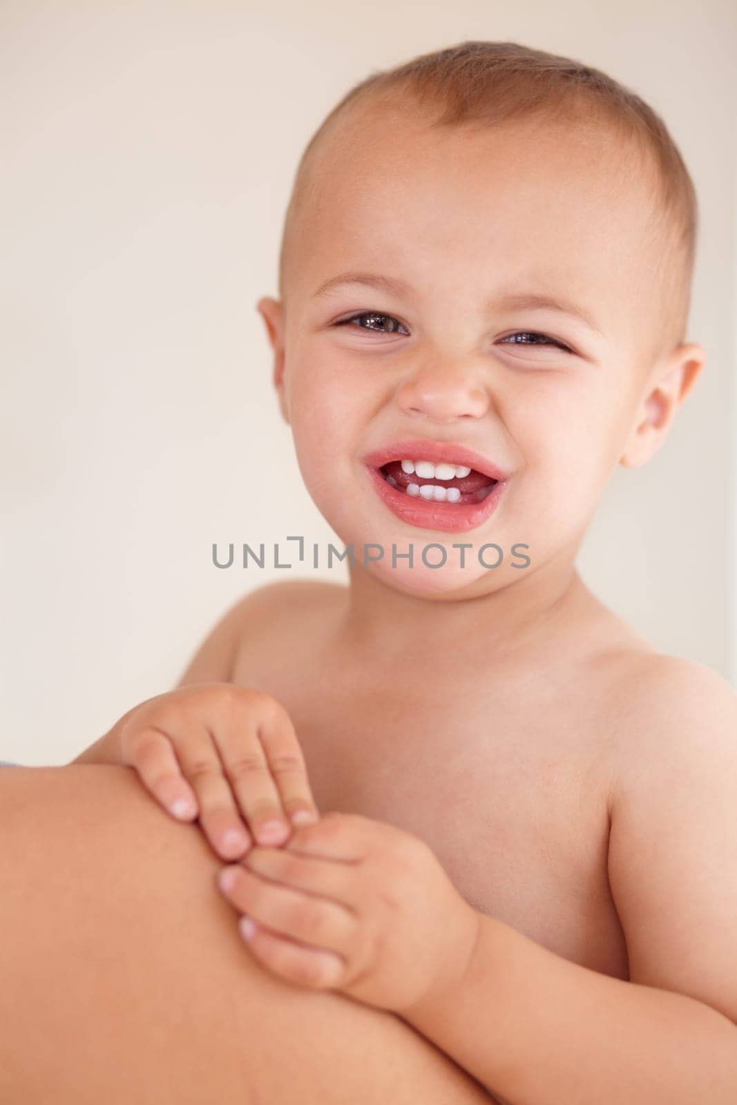 Sad, crying and portrait of boy baby by his mom with unhappy, upset and naughty personality. Tired, annoyed and face of disappointed child, infant or kid toddler with tears for problem by his mother. by YuriArcurs