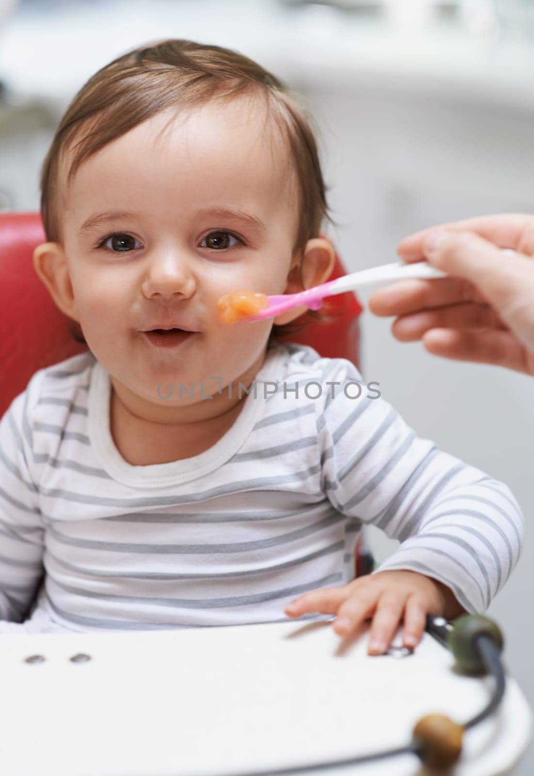 Eating, sweet and portrait of baby in chair with vegetable food for child development at home. Cute, nutrition and hungry boy kid or toddler enjoying healthy lunch, dinner or supper meal at house. by YuriArcurs