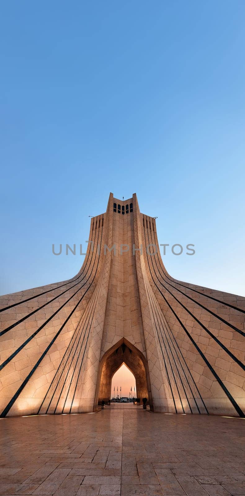 The Azadi Tower is a symbol of freedom in Iran, the main symbol of Iran's capital. MS ZI LA Azadi Tower - Freedom Tower, the gateway to Tehran, Popular tourist point at twilight. Tehran, Iran by EvgeniyQW