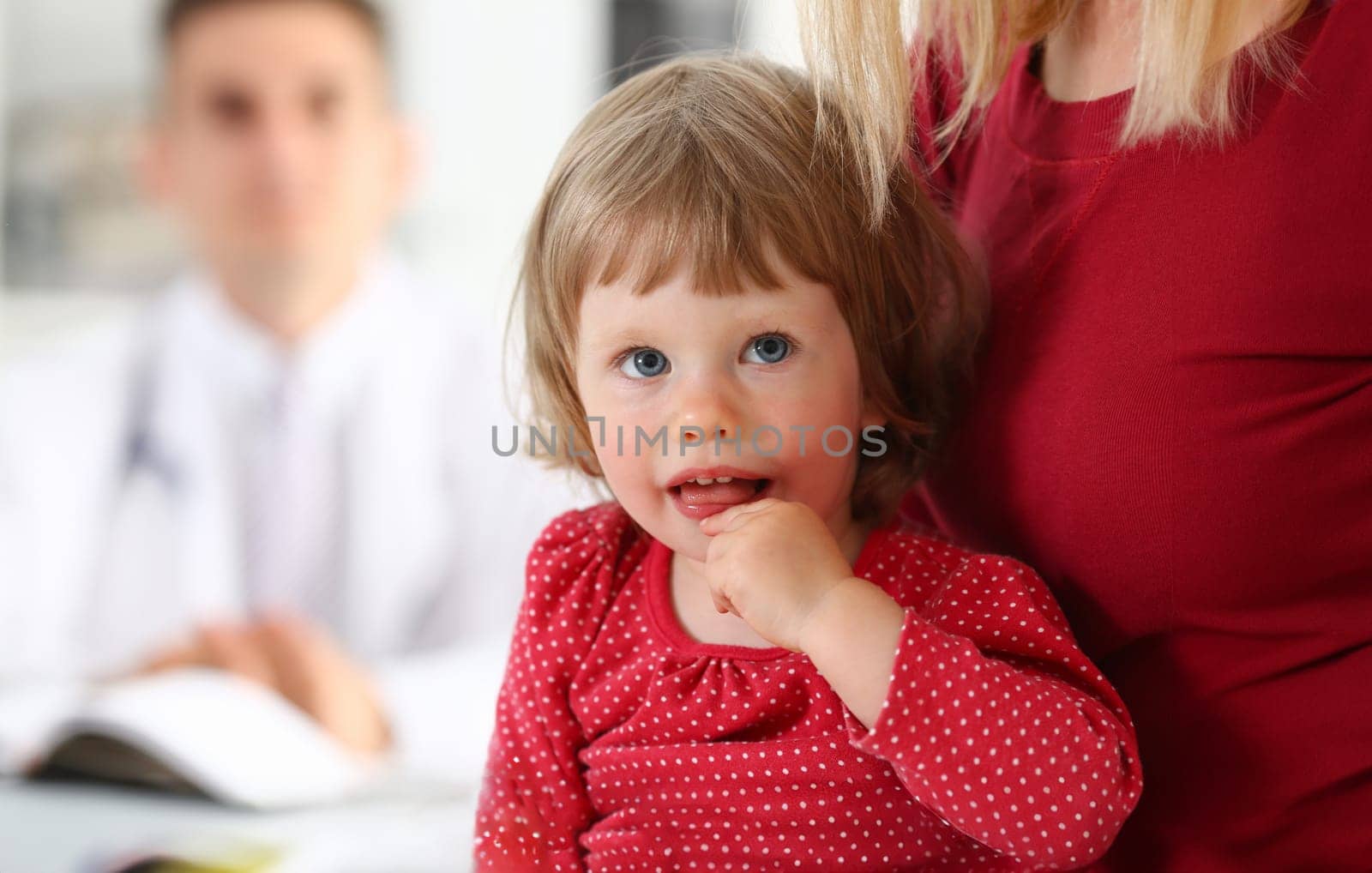 Little child with mother at pediatrician reception. Physical exam, cute infant portrait, baby aid, healthy lifestyle, ward round, child sickness, clinic test, high quality and trust concept