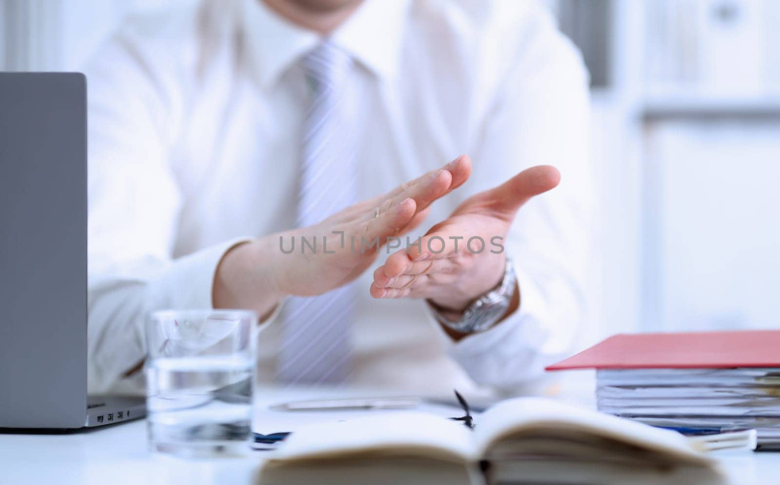 Man in suit clap his arms congrats for successful seminar in office closeup. Thank symbol great lecture job emotion worker introduce colleague negotiation happy birthday win career project idea
