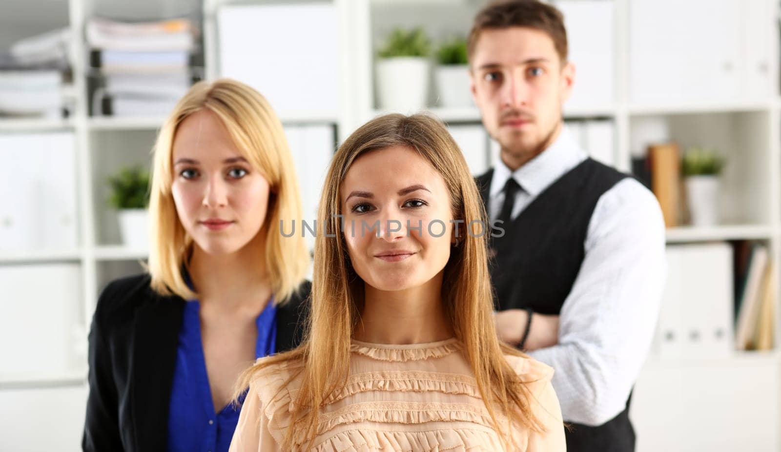 Group of smiling people stand in office looking in camera portrait. White collar power mediation solution project creative advisor participation profession train bank lawyer client visit concept