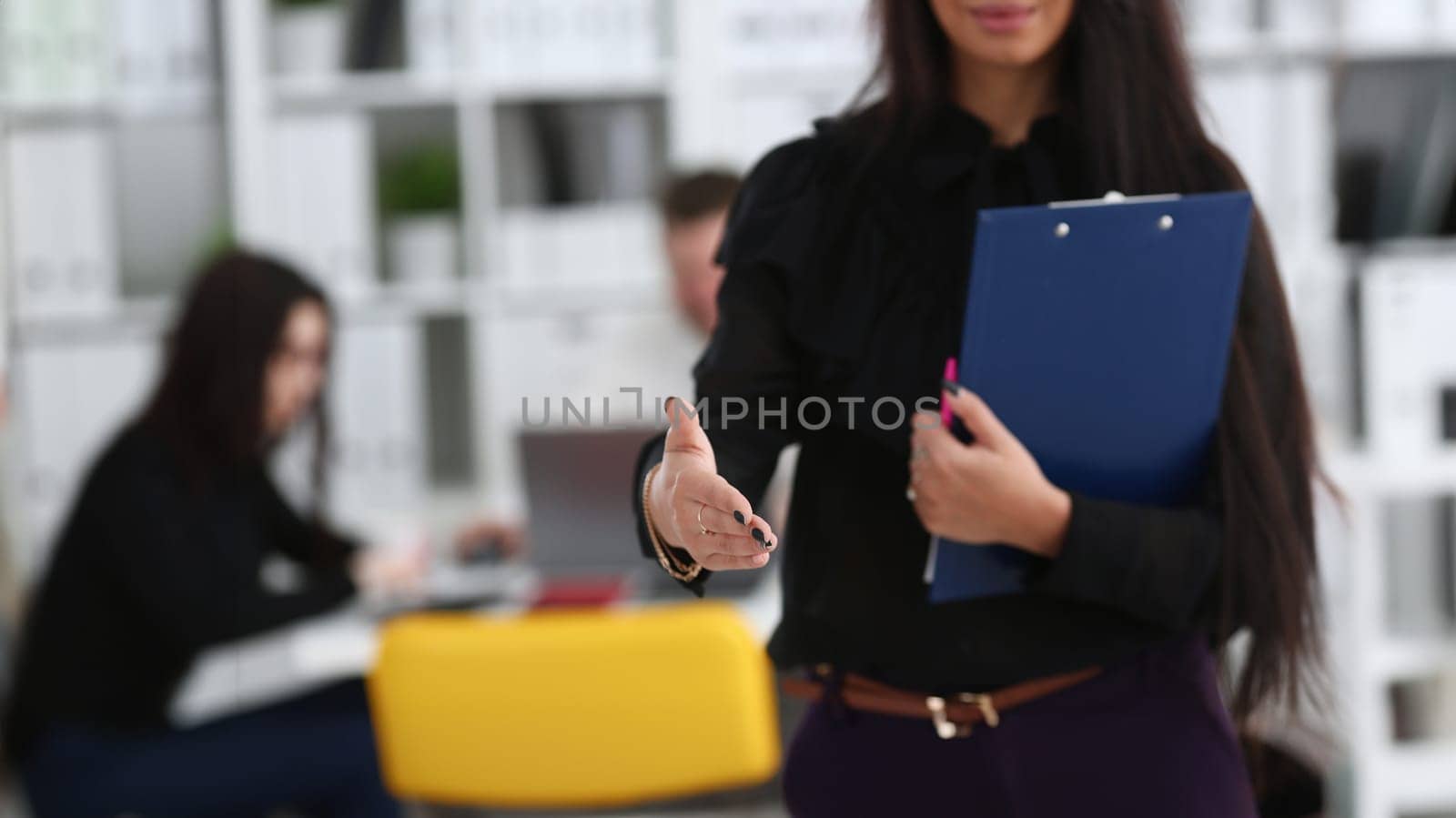 Woman hold document pad give arm as hello by kuprevich