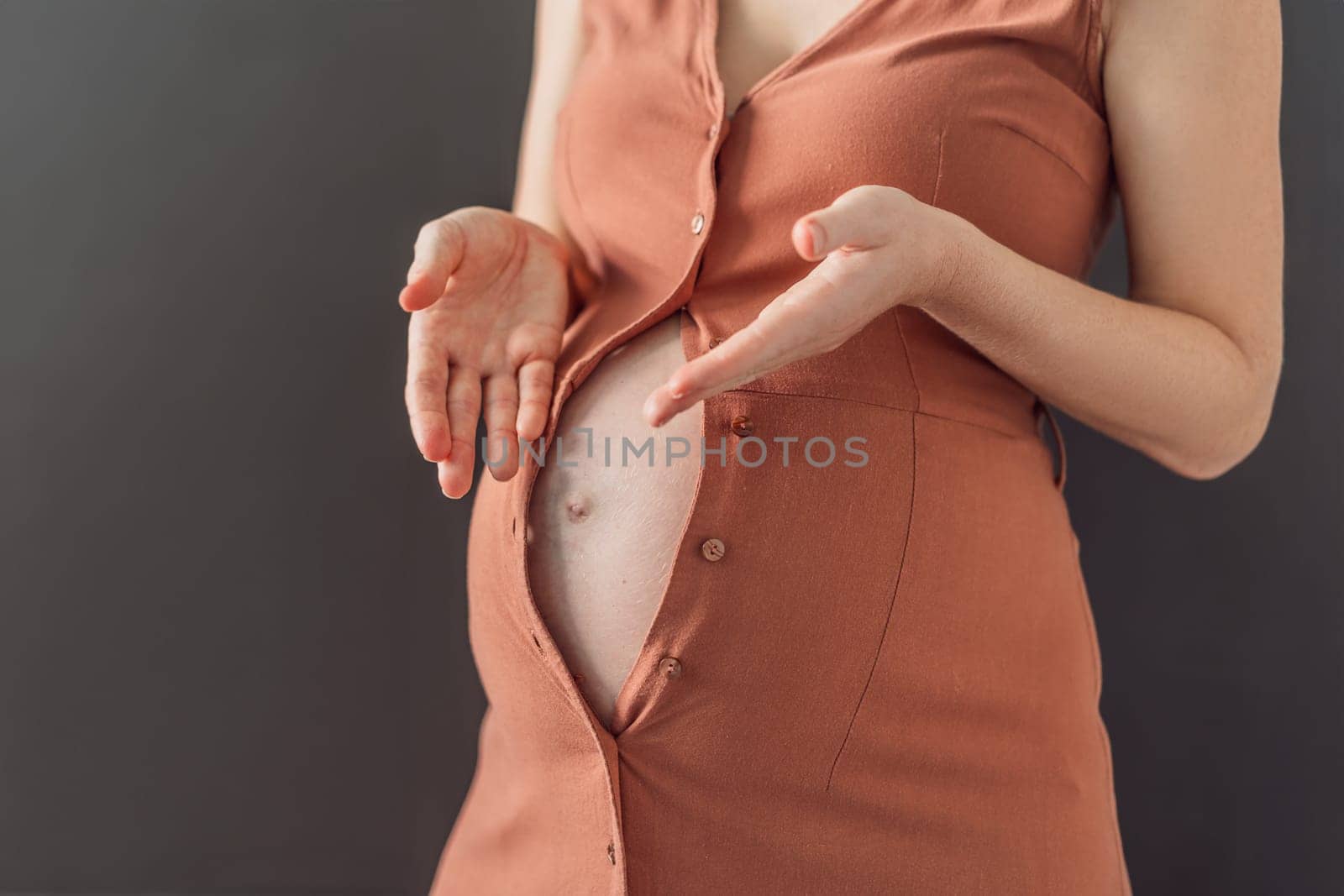 No need to struggle with the fastening. Choose a maternity dress that provides comfort and style to your pregnant belly by galitskaya